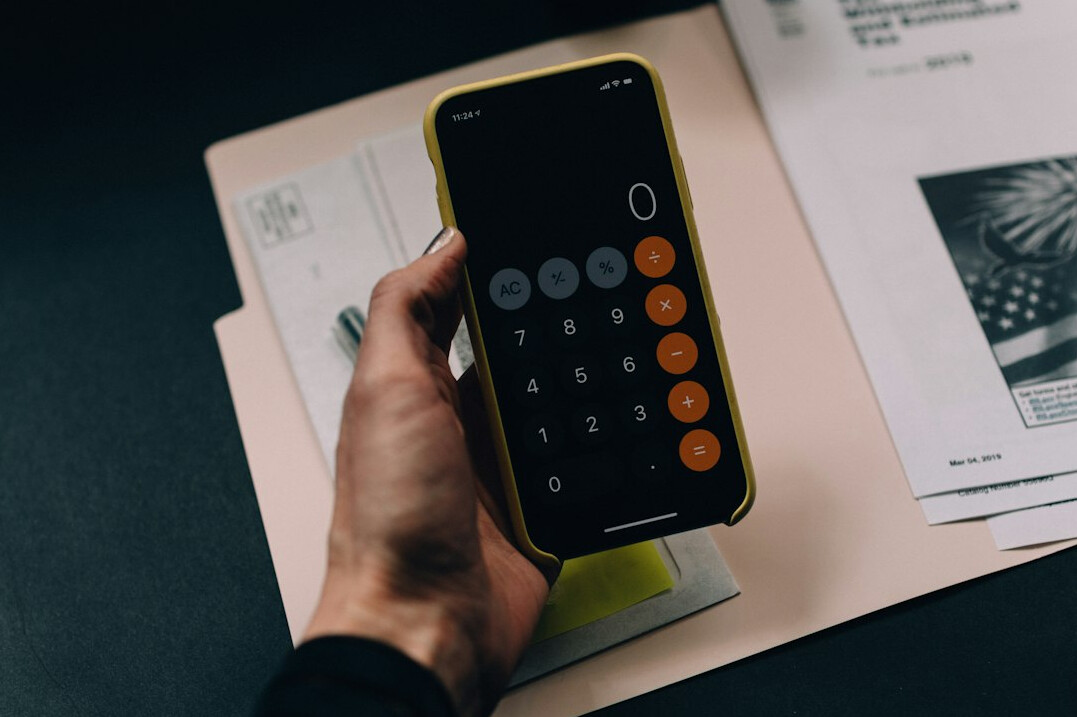 person calculating finances